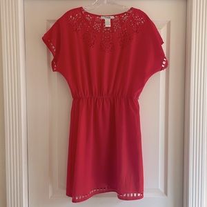 Medium Dress with fun design along them hem line and sleeves